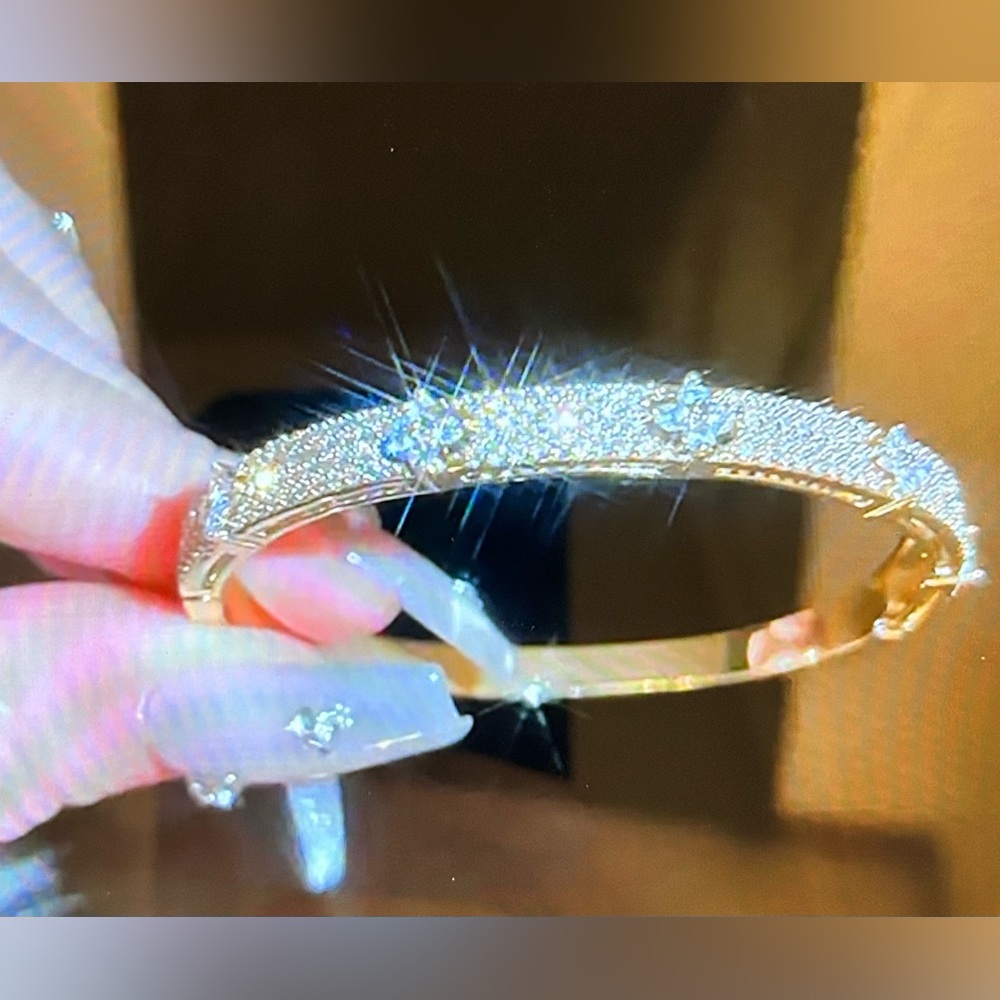 Gold Tone Clover Bangle Bracelet with Inlaid Zircon Stones | 7”
